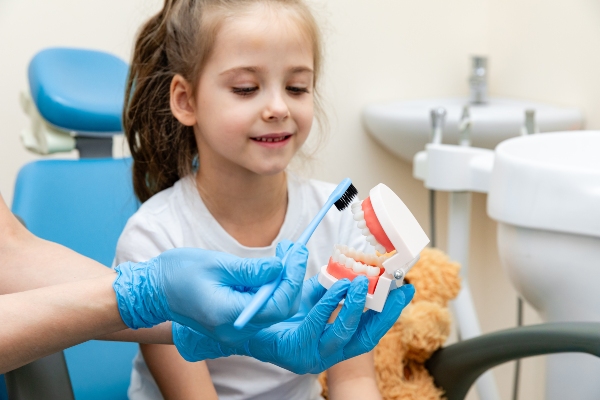 The Role Of A Family Dentist In Preventing Cavities And Gum Disease